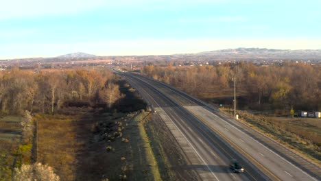 Panning-aerial-of-an-American-freeway-during-the-morning-glow