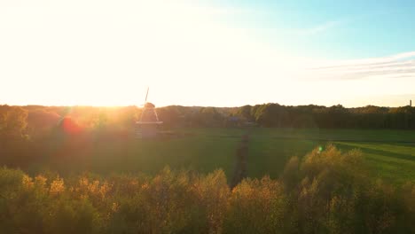 sunset over a dutch windmill