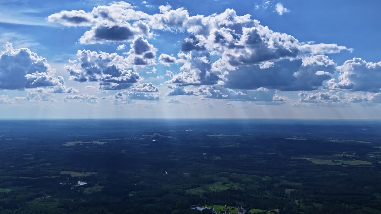 Cloudscape At Sunrise Over Scenic Lush Nature. Aerial Descending Shot