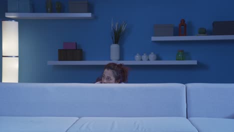 the woman hiding from fear.