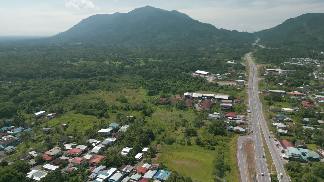 Aerial Drone View, Serian District Town ,Summer With Beautiful Green Trees,New Building And Water Park Lake, Water From The Mountain Sarawak,Borneo.