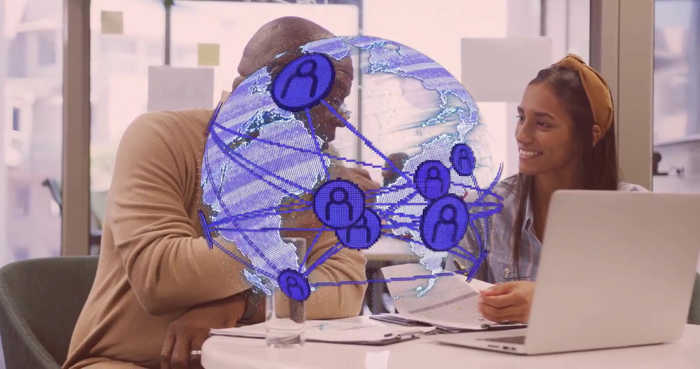 Business advisor and colleague reviewing docs while spinning globe appearing for network analysis