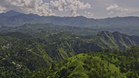 ella sri lanka aerial v23 cinematic low level drone flyover lush green valley capturing hillside resort hotels and beautiful vistas landscape of rolling mountains - shot with mavic 3 cine - april 2023