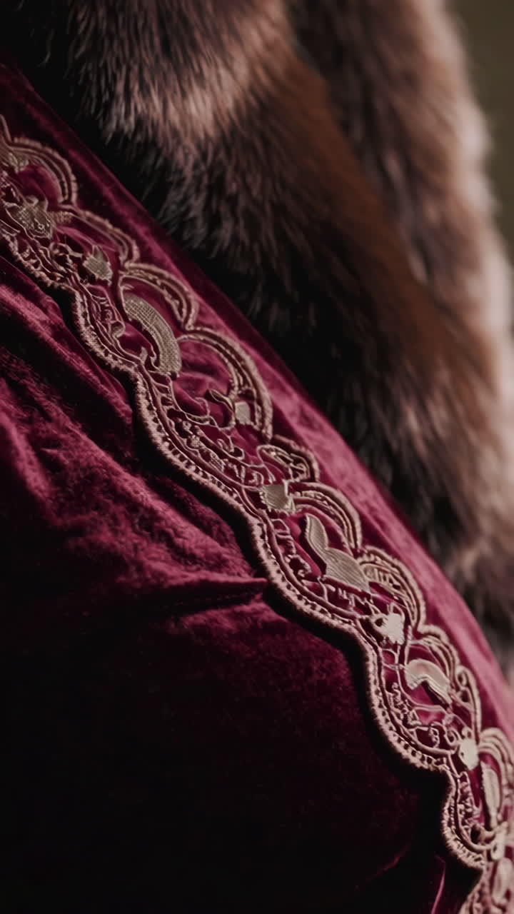 Close-up of a Vintage Red Velvet Coat with Fur Collar and Lace Embroidery