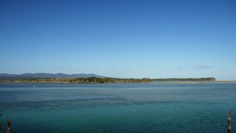 panning view out over the mallacoota inlet in the afternoon, victoria, australia