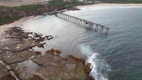 seascape and jetty in catherine hill bay, central coast, nsw, australia - drone shot