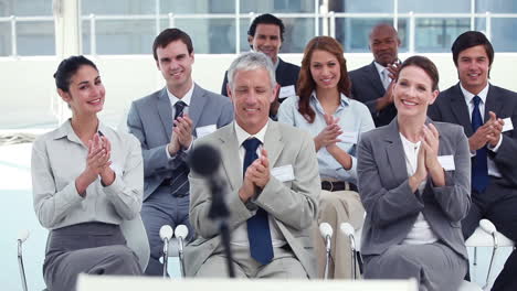 business people applauding