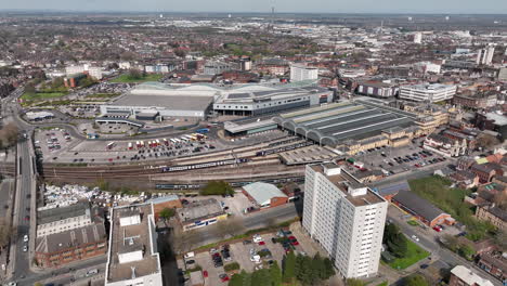 Distant-aerial-tracking-shot-of-a-train-entering-Hull-Paragon-station-in-Kingston-upon-Hull