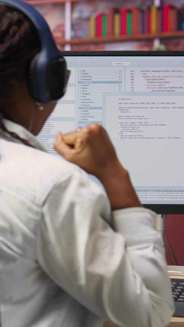 Vertical video Excited programmer testing code on PC, clapping hands after positive result