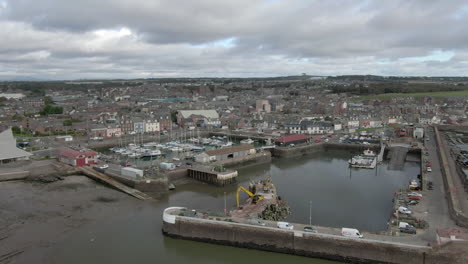 an aerial view of arbroath harbour and town on a cloudy day