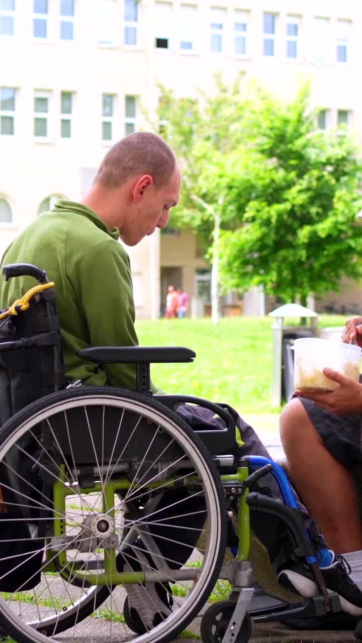 Assistance and Care: A Person Being Fed While in a Wheelchair