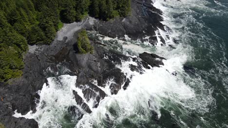 zenith view of big waves crashing on rocky shore of botany bay from above