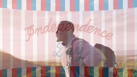 animation of independence day text over african american man hiking