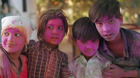 kids celebrating the hindu festival of holi in rajasthan, india