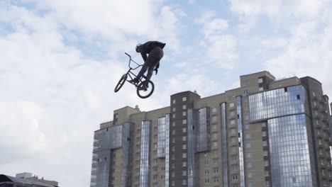 freestyle bmx jumping in urban environment