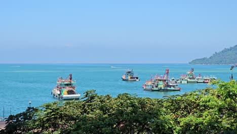 colorful fishing boats on harbor of kota kinabalu in sabah, malaysia. static shot