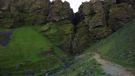 large crevasse in mountain in snaefellsnes peninsula, iceland, wide shot tilt up