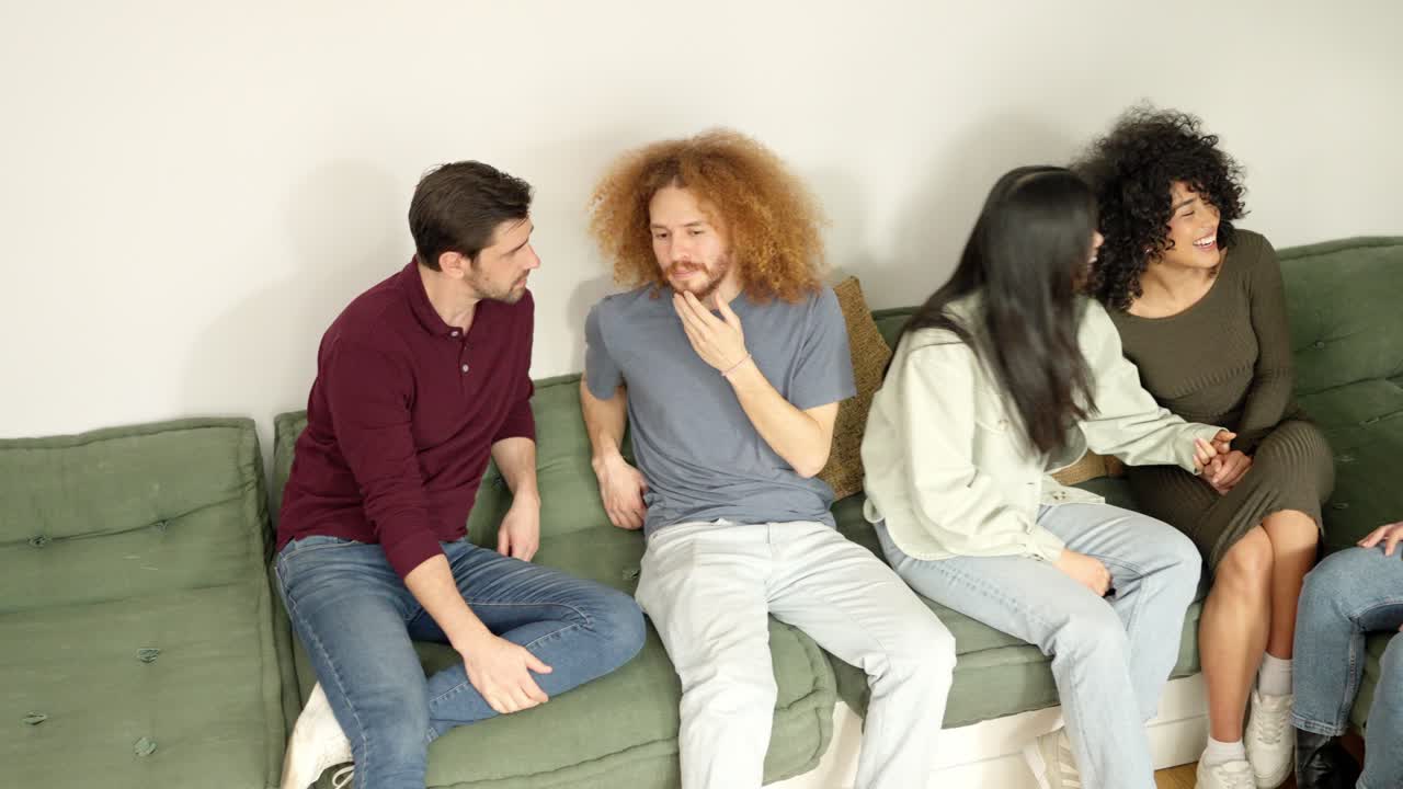 Diverse people chatting chill in a living room