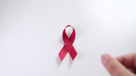 red ribbon: a symbol of hiv/aids awareness