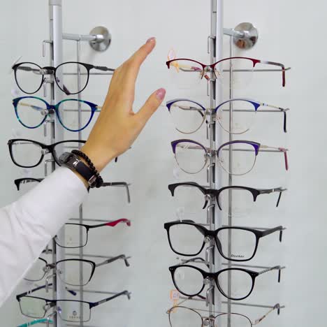 woman hand choosing glasses
