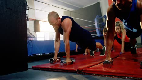 boxers excising with dumbbells