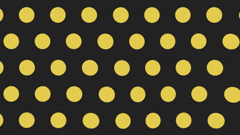 simple yellow dots geometric pattern in rows on black gradient