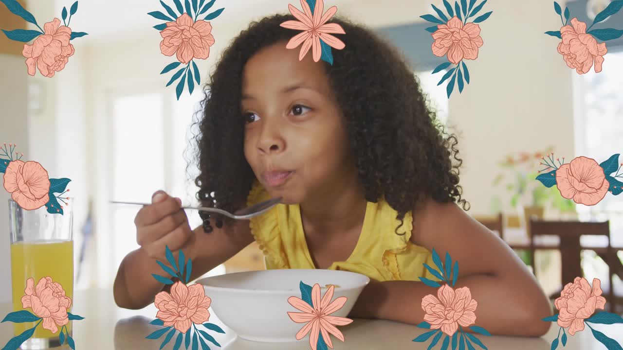 animación de flores sobre una chica afroamericana desayunando en casa