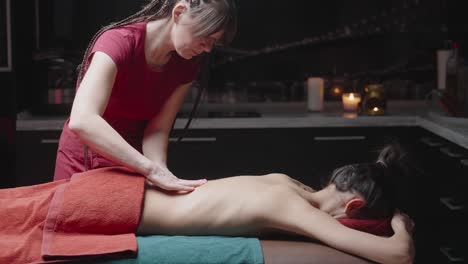 woman receiving a back massage