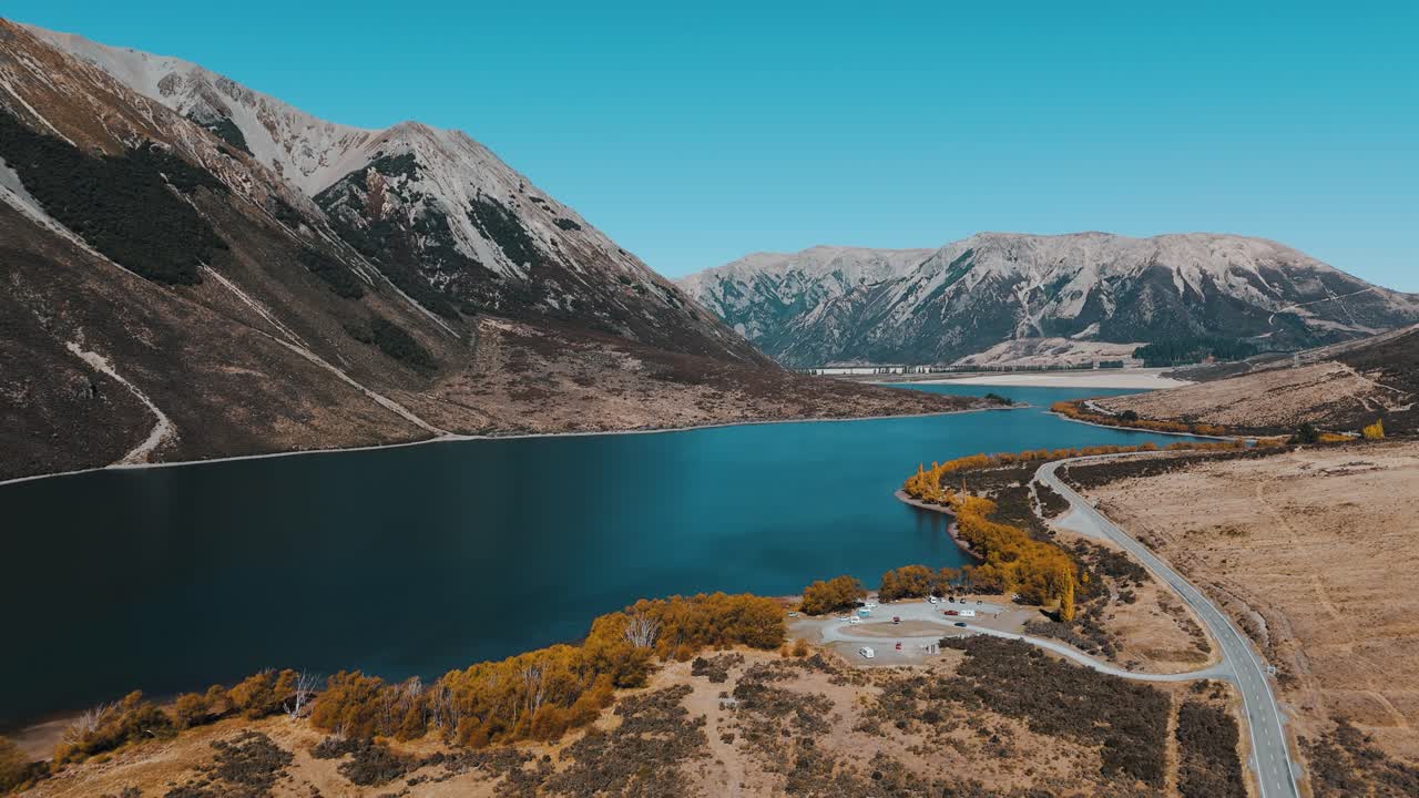Golden autumn over Lake Pearson, Arthur's Pass. Drone view