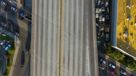 Top-down-drone-shot-over-the-damaged-Santa-Monica-freeway-in-Los-Angeles,-USA