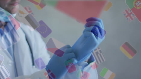 animación de banderas mundiales flotantes con las manos de un médico que se pone guantes