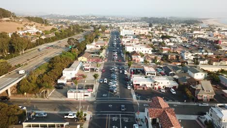 aerial static shot over pismo city main road and crossroad, california