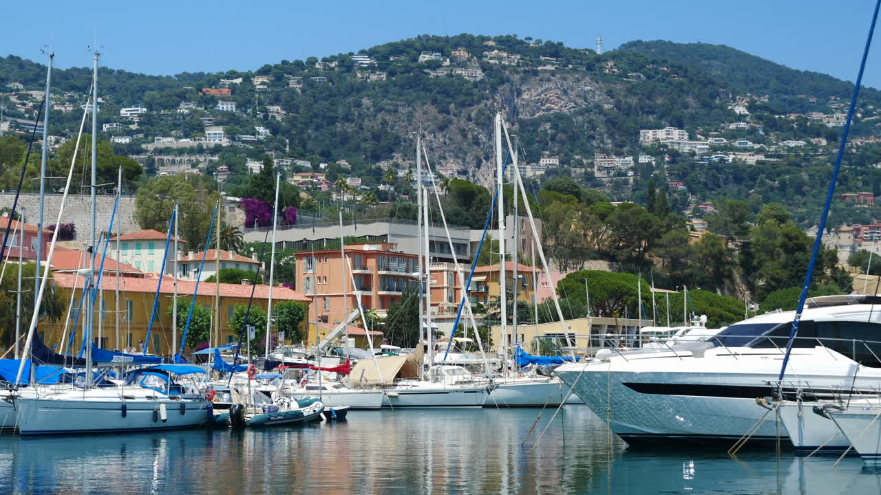 Relaxing Sunny Harbour Scene in Villefranche-sur-Mer, Hillside backdrop - Static