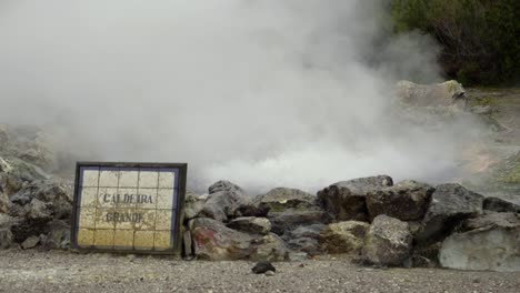 steam rising from a natural hot volcanic fumarole in the frunas, azores