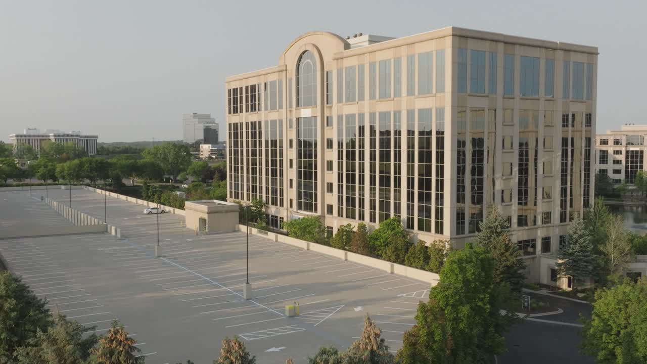 Aerial View of an Empty Corporate Office Building Parking Lot