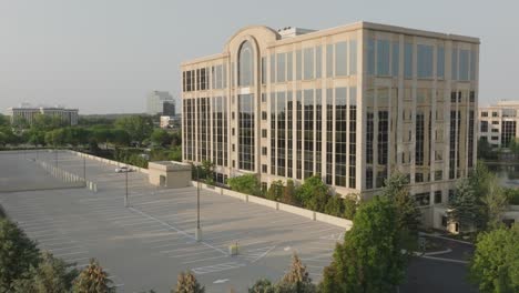 aerial view of an empty corporate office building parking lot