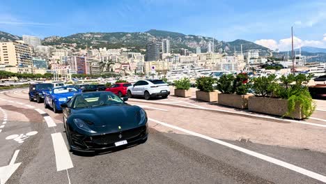 exotic cars driving near monte carlo harbor