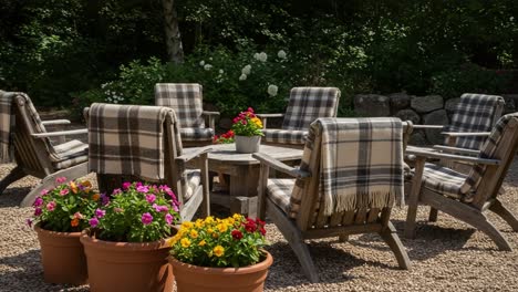 inviting outdoor seating area with cozy blankets and vibrant flower pots, perfect for relaxing gatherings in a tranquil garden setting