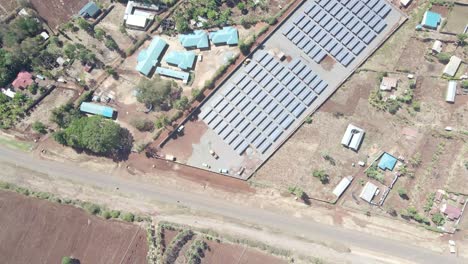 solar panel in farm--green bio organic low waste smart agriculture - solar panels pumping water farm kenya africa covid 2020-2021 social distancing 2020 new year 2021