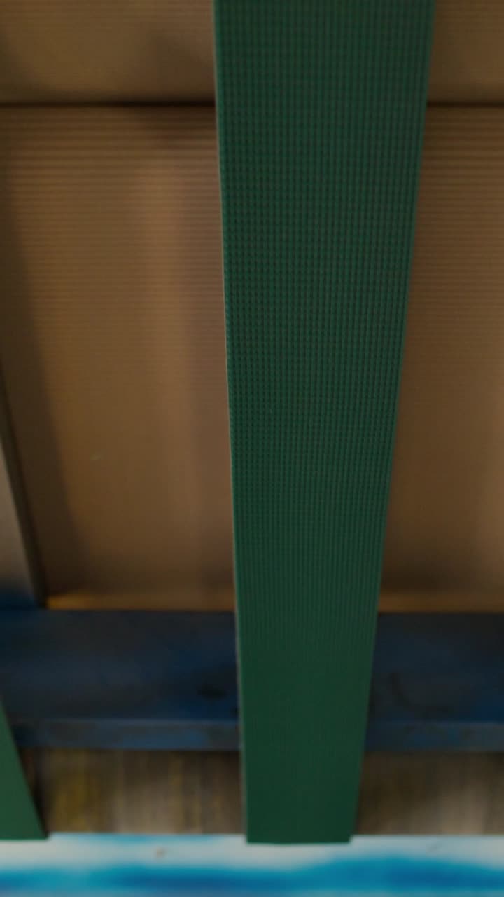 Close-up view of composite paneling and support beams