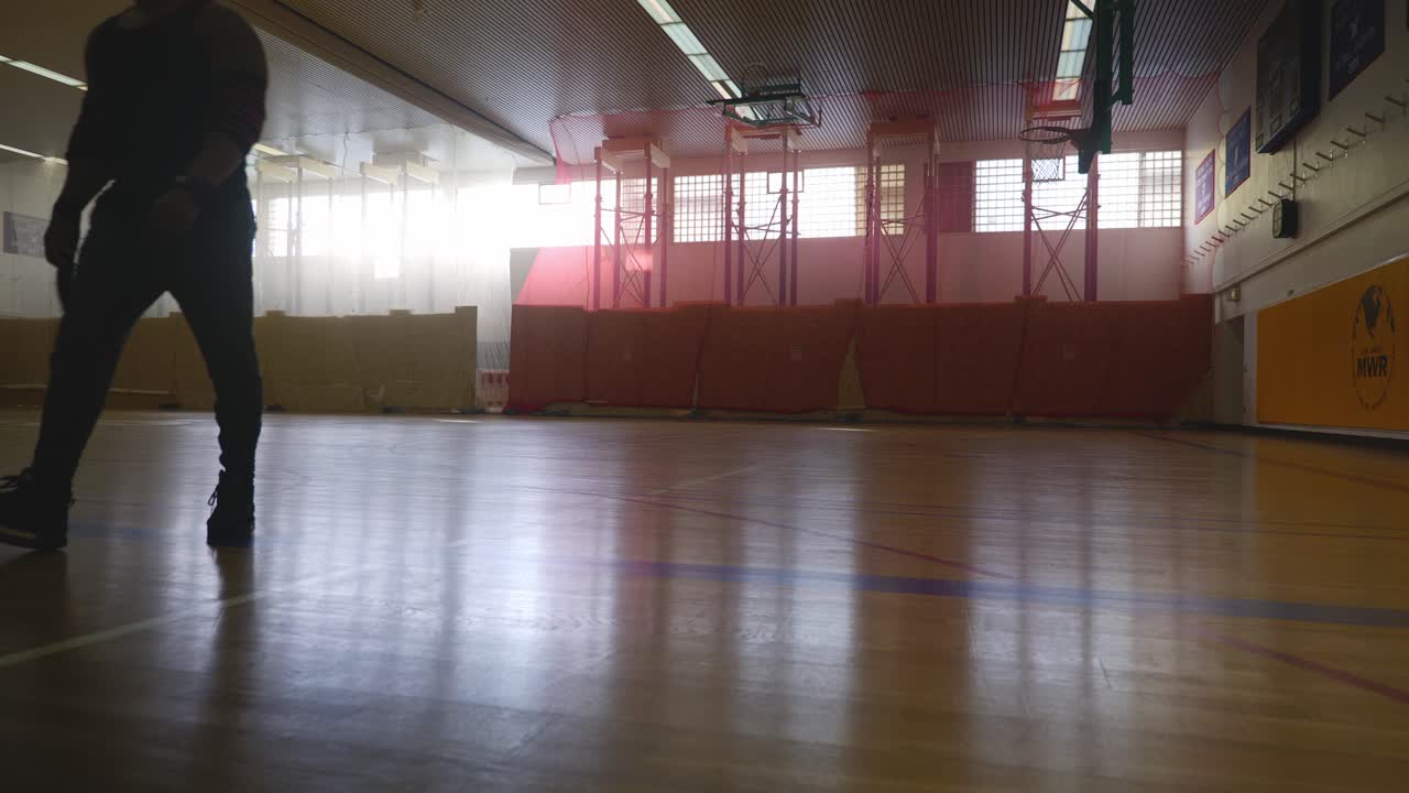 Male Standing and Walking Away - Strong Athletic Muscular Black Man Standing On Basketball Court Looking Around In 4K