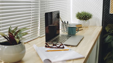 comfortable workplace on window sill at home