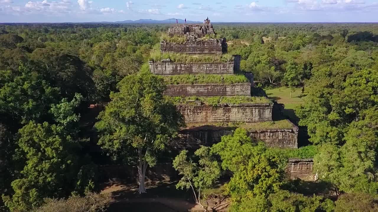 Old and historic temple complex of Koh Ker deep in the remote and untouched jungle of northern Cambodia. Aerial parallax