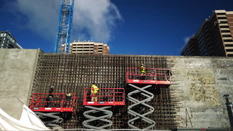 construction workers on a high rise building