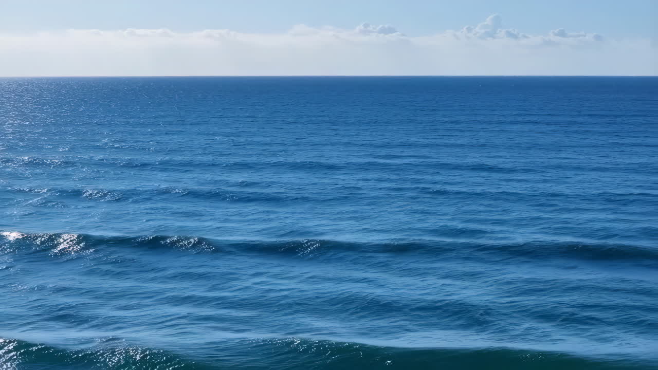 Vast Blue Ocean with Gentle Waves and Horizon