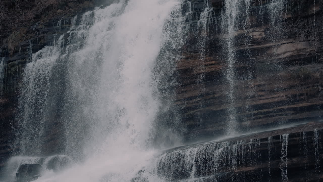Waterfall Cascading Down Rocky Cliff