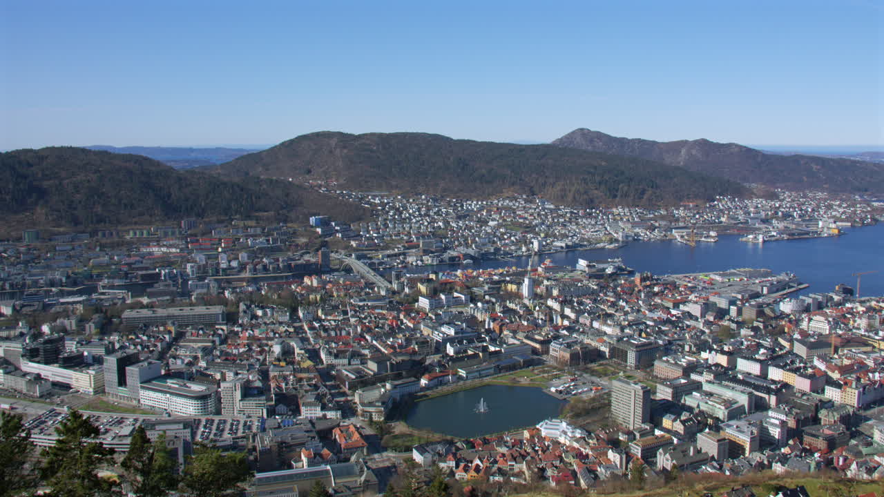 Wide shot looking west over the city of Bergen. Filmed from Fløyen Panorama