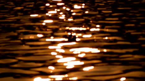 abstract blurred bokeh background of the water in twilight