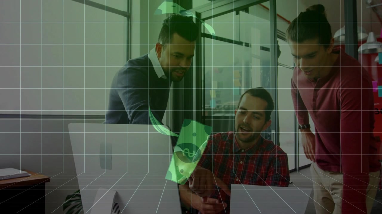 Colleagues collaborating at computer screen while analyzing financial documents with green overlay