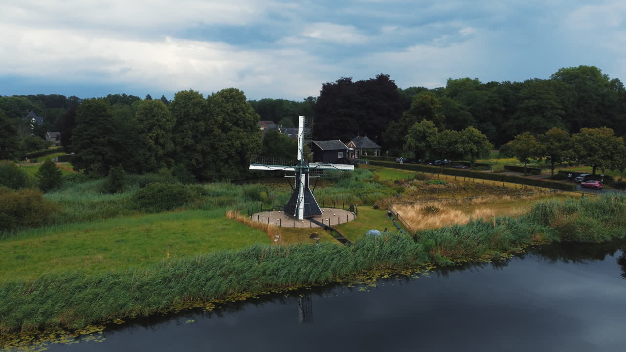Keppel water mill: aerial view in orbit to the beautiful mill located in the netherlands and on a sunny day